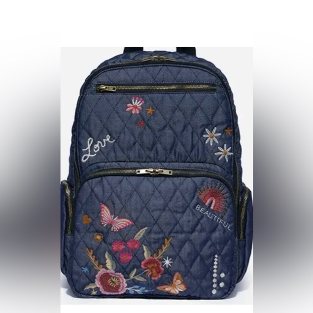 Johnny Was quilted denim blue backpack.